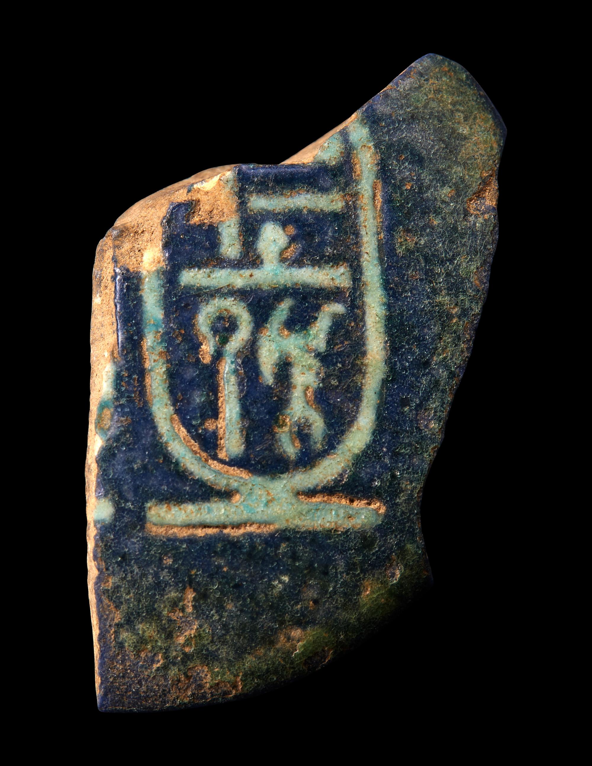 An Egyptian Bichrome-Faience Djed Pillar Fragment with the Cartouche of Amenhotep III