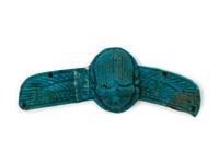 An Egyptian Faience Winged Scarab