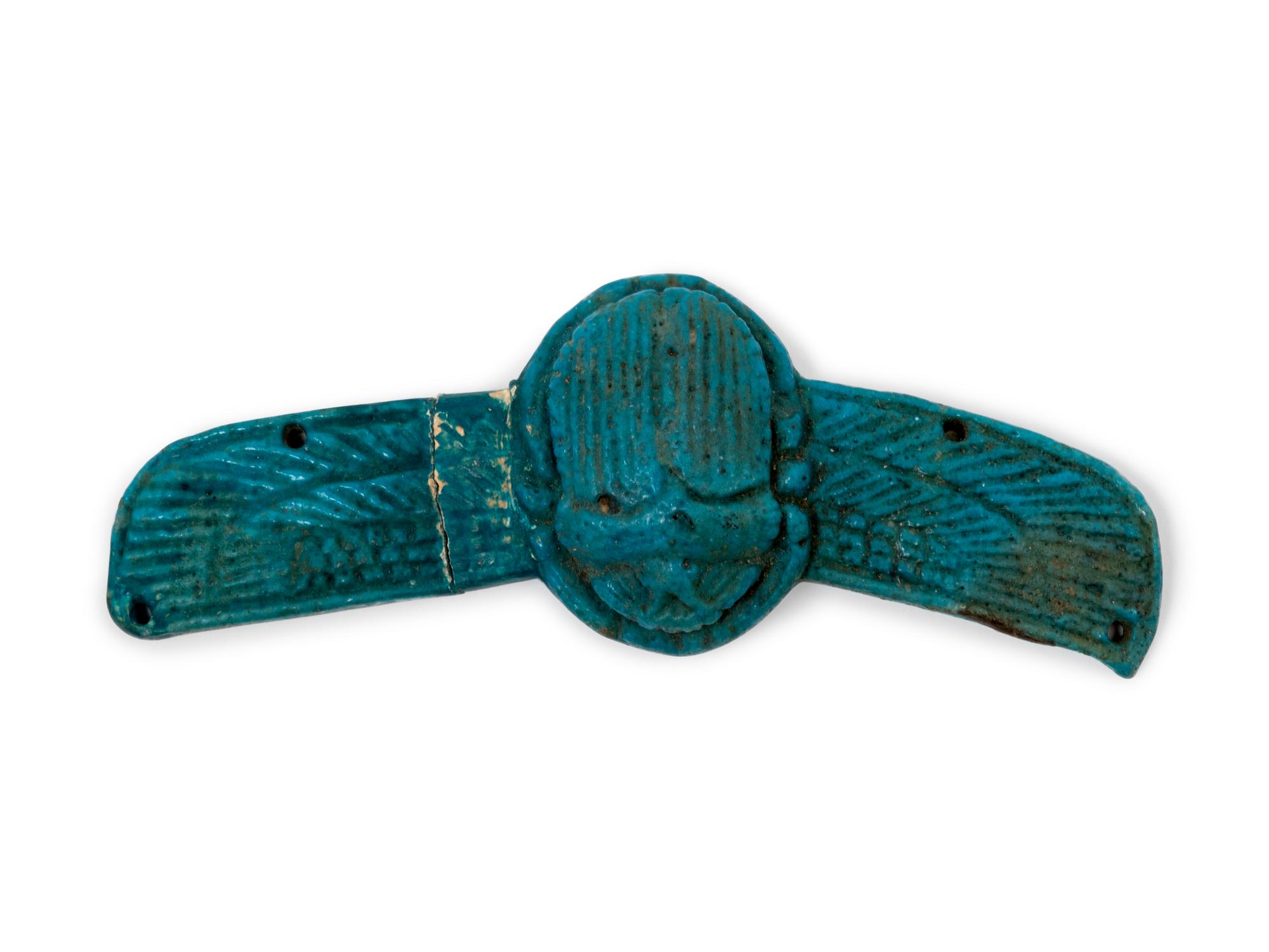 An Egyptian Faience Winged Scarab