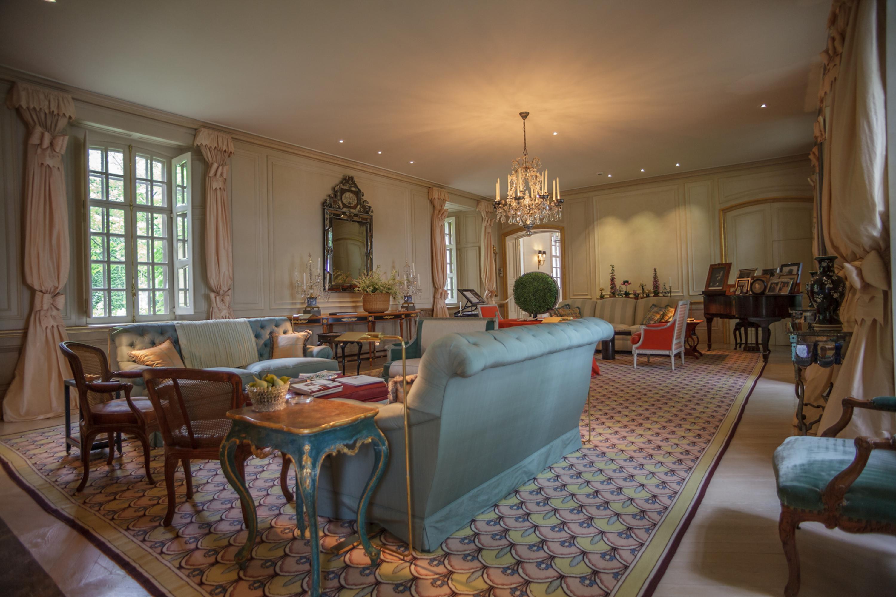 A Pair of Louis XVI Carved and Painted Marble-Top Pier Tables