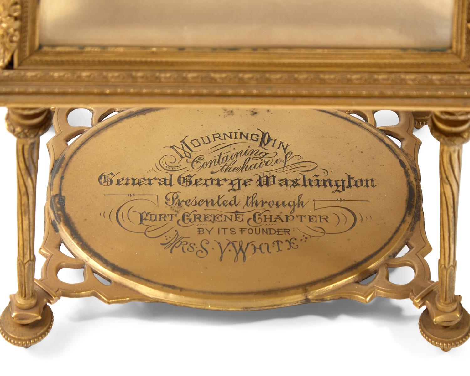 A Mourning Brooch With Hair Of George Washington Mounted In A Gilt Bronze And Glass Vitrine