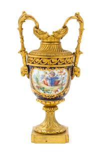 A Sevres Style Gilt Bronze Mounted Porcelain Urn Height 8 inches. — 19TH CENTURY