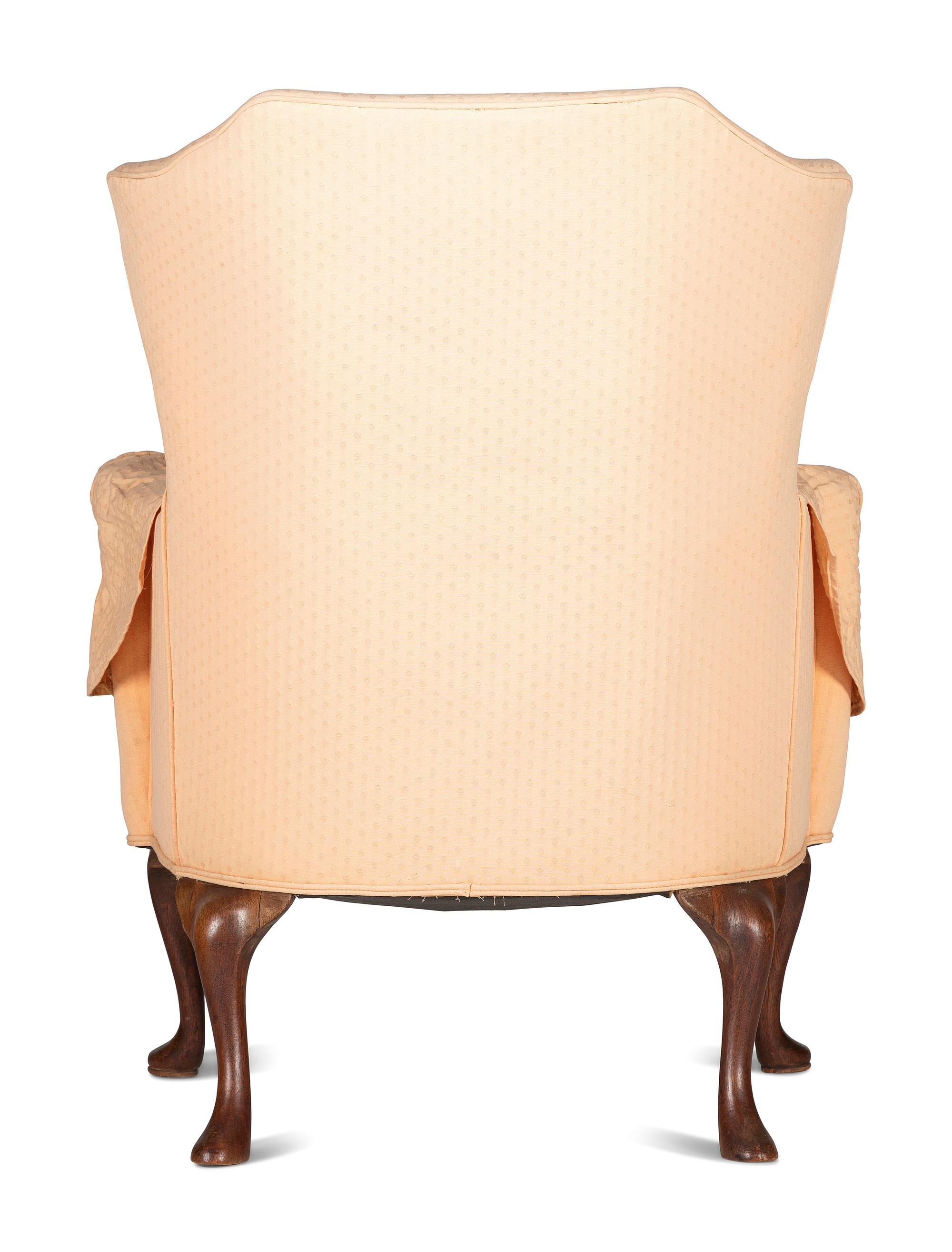 A Queen Anne Style Carved Walnut Upholstered Easy Chair