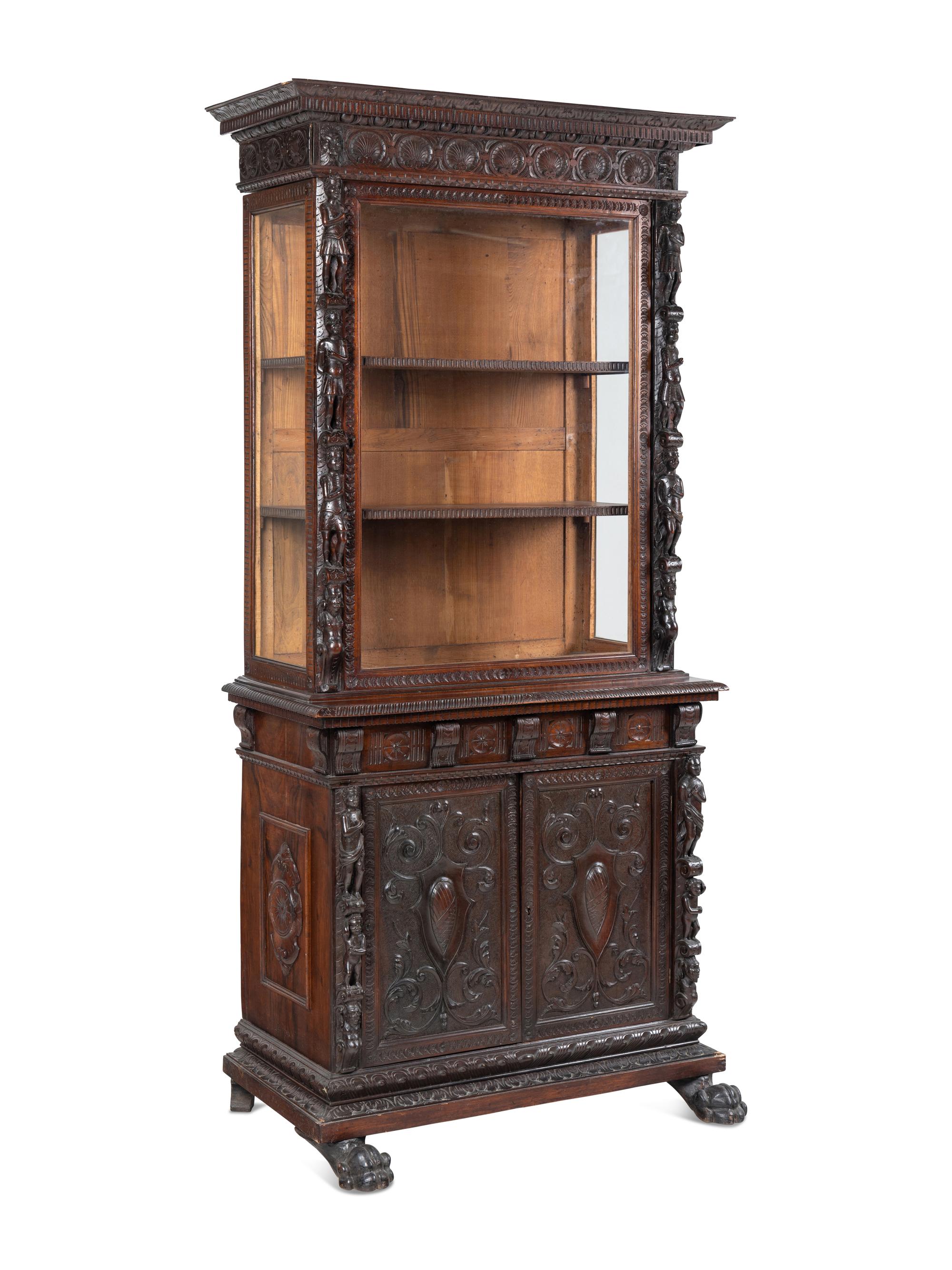 An Austrian Carved Walnut Cabinet