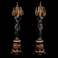 A Pair of Monumental Gilt and Patinated Bronze and Rouge Marble Figural Torchères