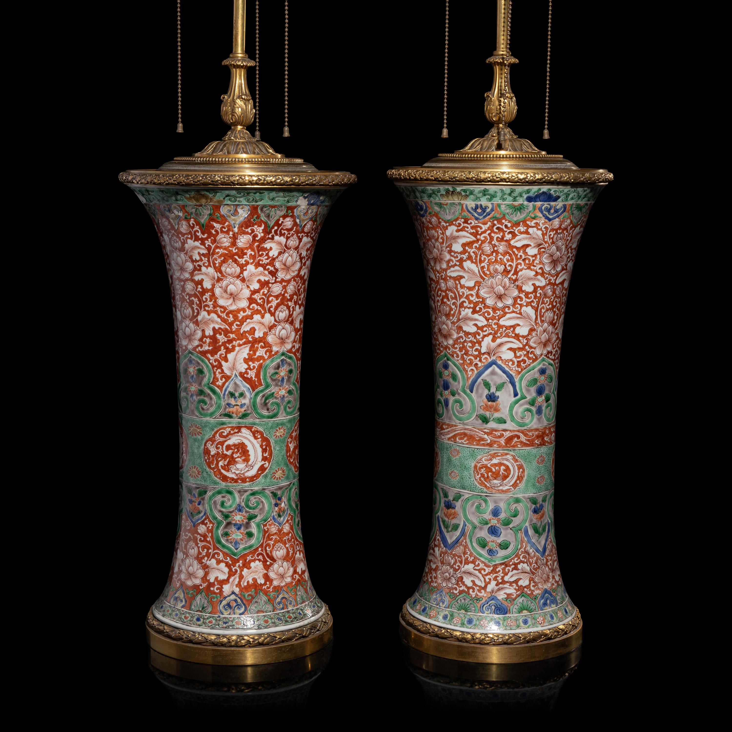 An Associated Pair of Chinese Famille Verte 'Flowers' Porcelain Gu Vases, 18th/19th Century — 清中期 五彩纏枝花卉紋觚一對
