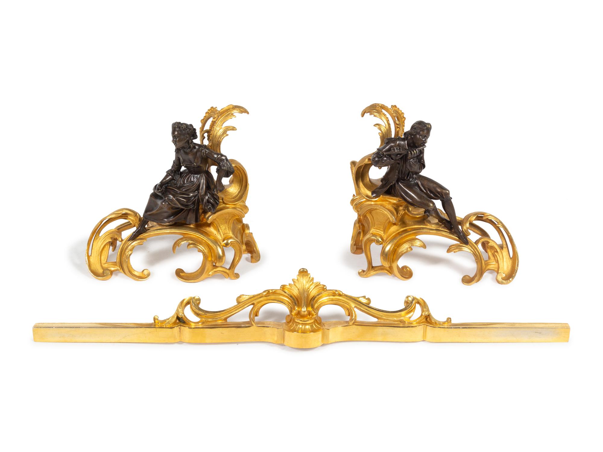 A Pair of Louis XV Style Gilt and Patinated Bronze Figural Chenets