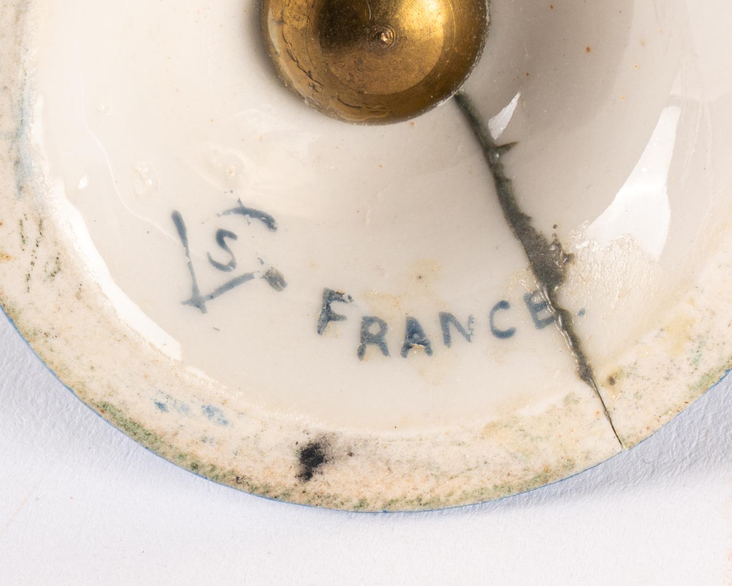A Sevres Style Gilt Metal Mounted Porcelain Covered Urn