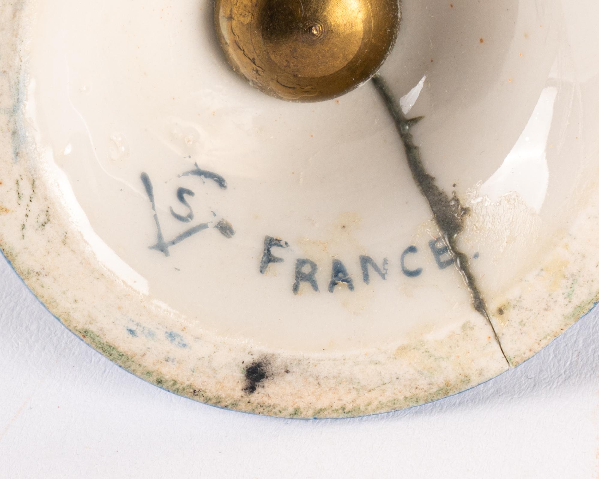 A Sevres Style Gilt Metal Mounted Porcelain Covered Urn