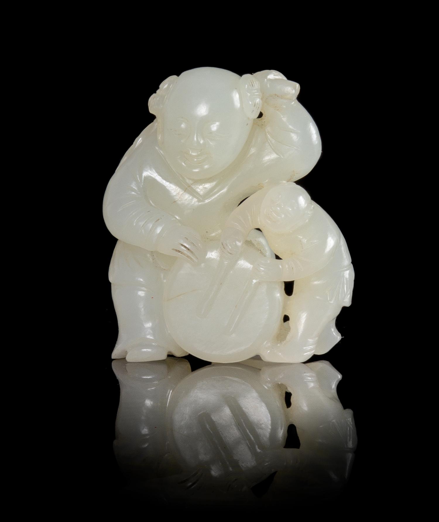 A White Jade Toggle Height 1 3/4 inches.