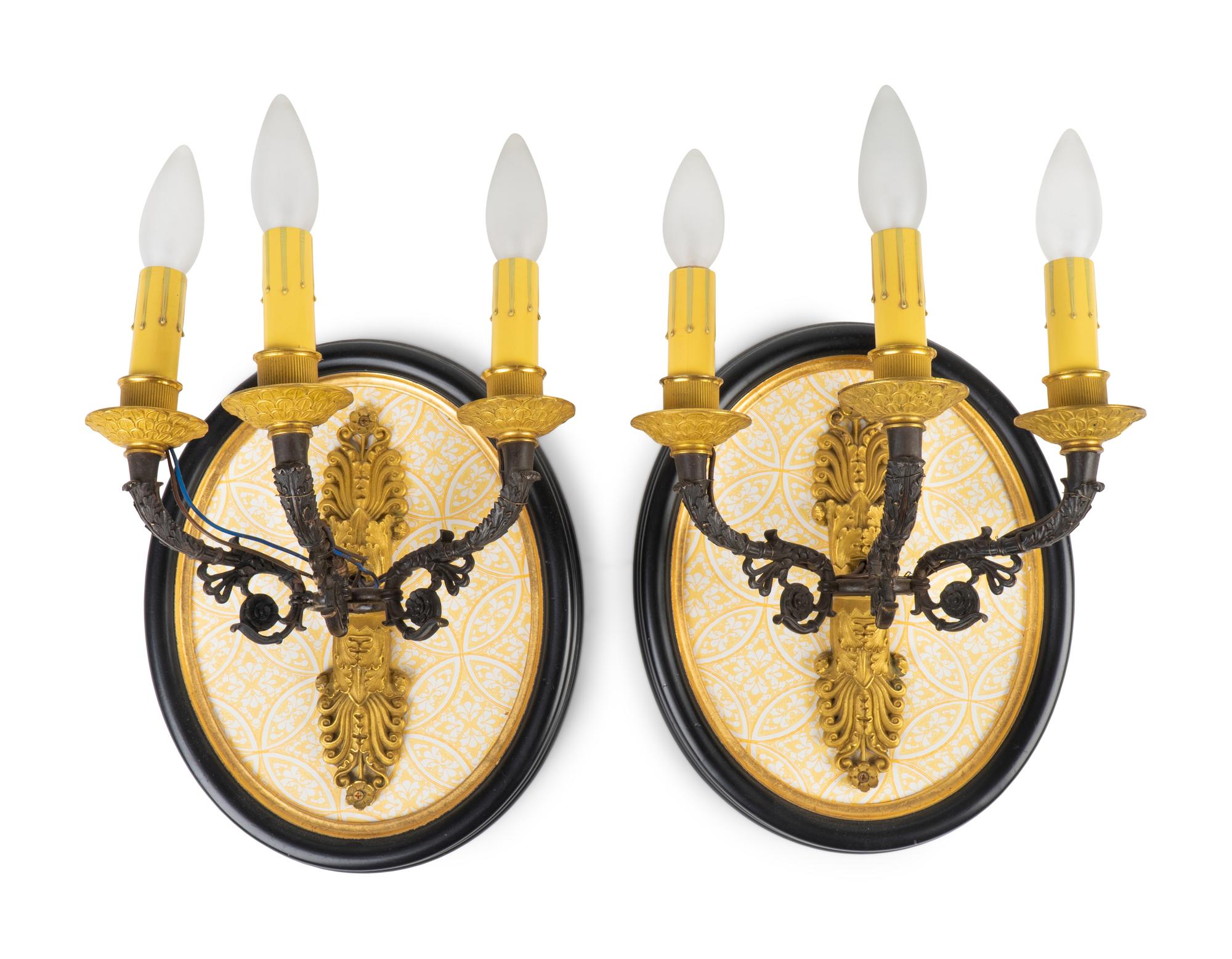 A Pair of French Empire Style Bronze and Gilt Bronze Three Light Wall Sconces — 19TH/20TH CENTURY