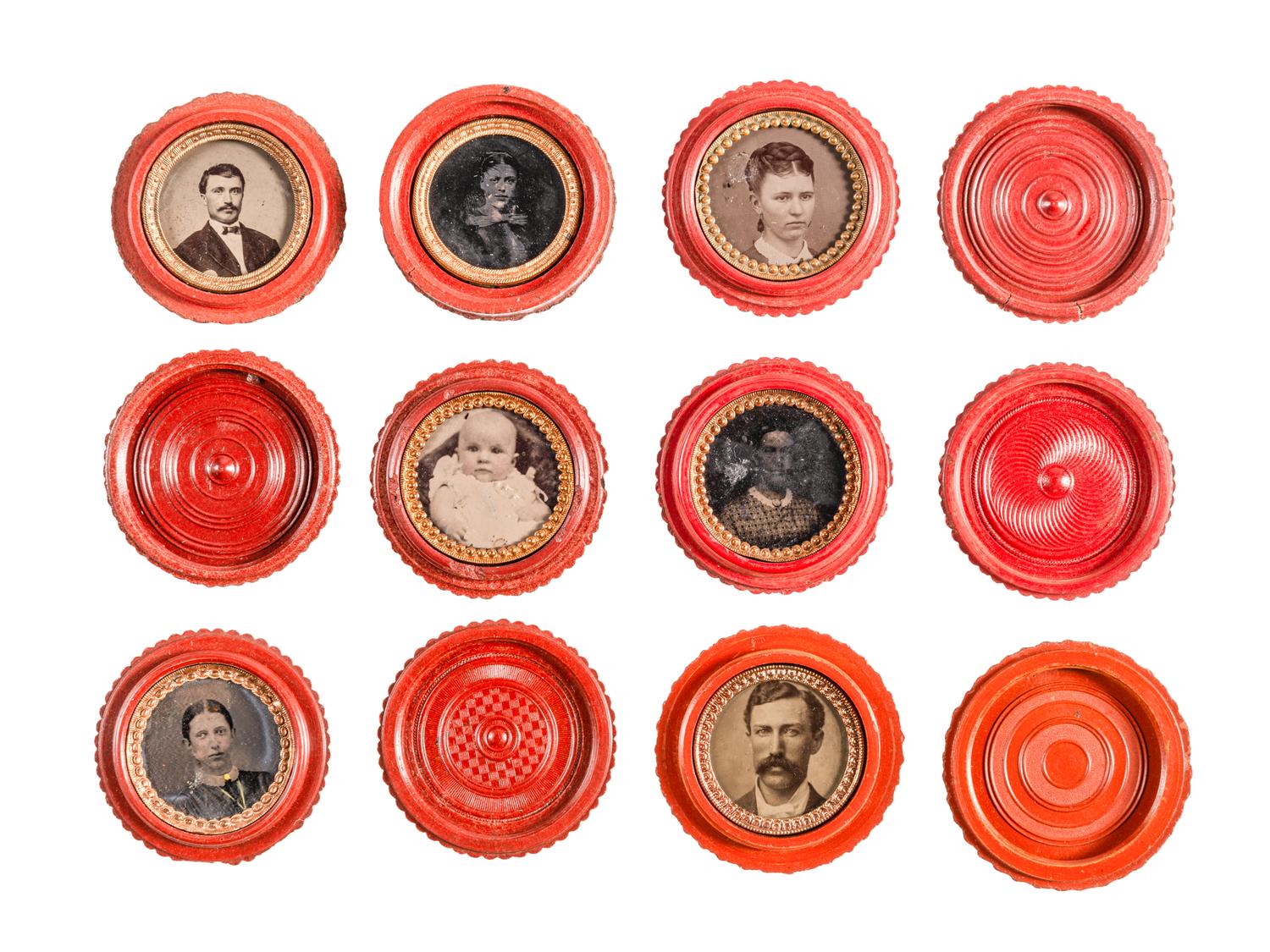 [EARLY PHOTOGRAPHY - UNION CASES]. A group of 7 red "oreo" cases containing assorted portraits, including: