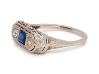 A White Gold, Diamond and Synthetic Sapphire Ring,