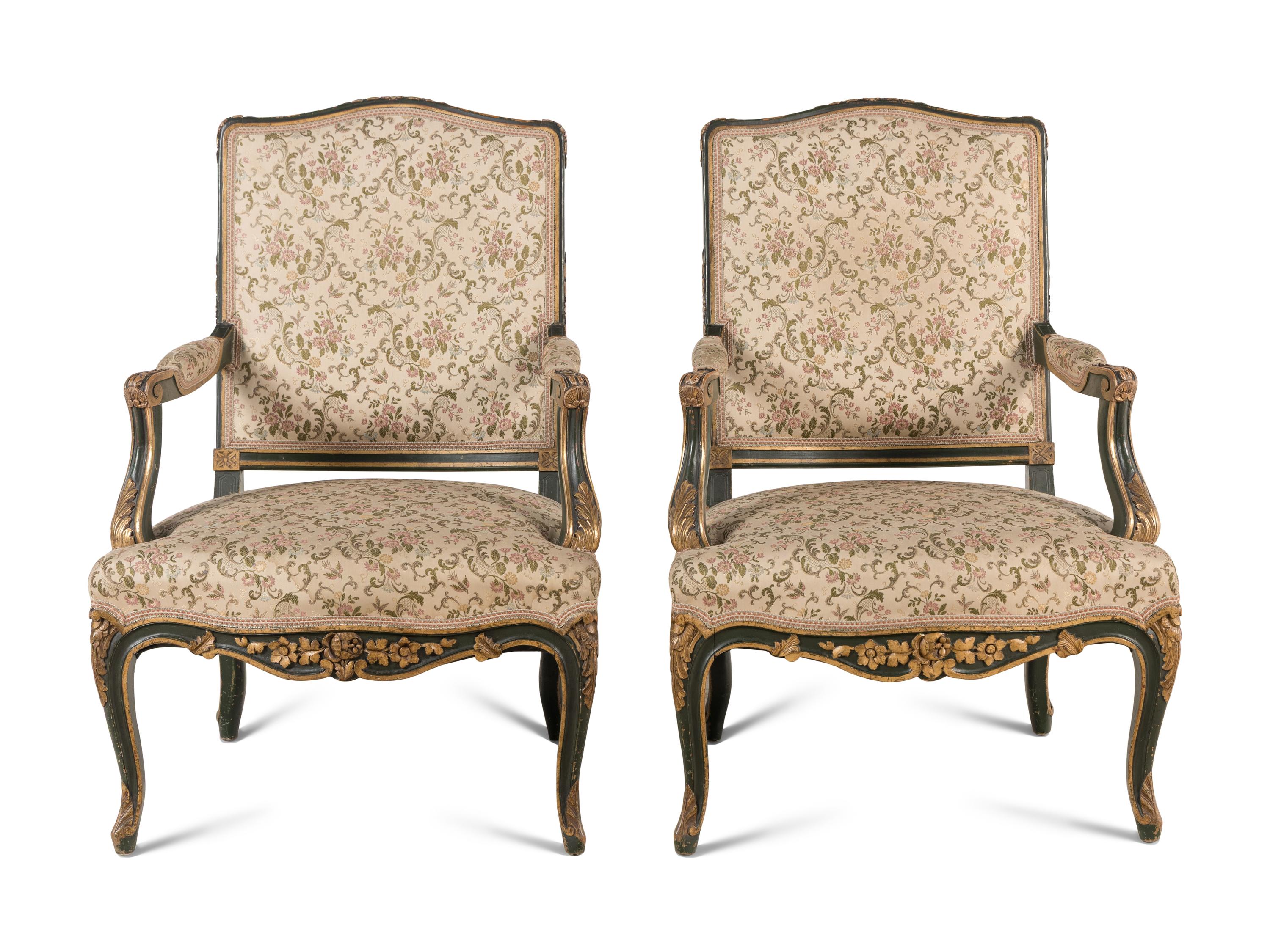 A Pair of Italian Rococo Style Painted and Parcel Gilt Fauteuils