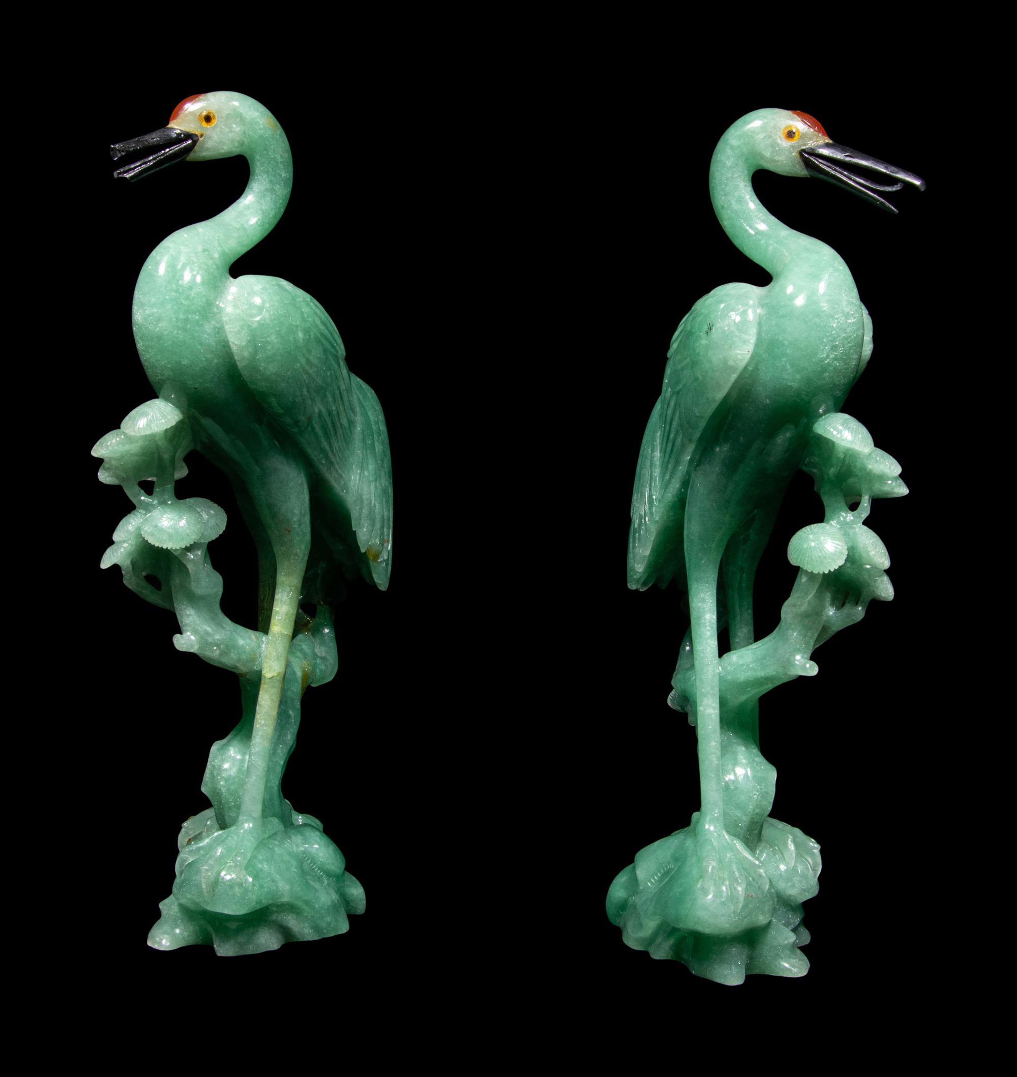 A Pair of Chinese Green Quartz Figures of Cranes