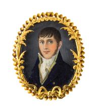 A Continental Portrait Miniature, Height 2 inches.