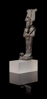 An Egyptian Bronze Amulet of Osiris Height 2 3/4 inches. — LATE PERIOD TO PTOLEMAIC PERIOD, 664-30 B.C.E.