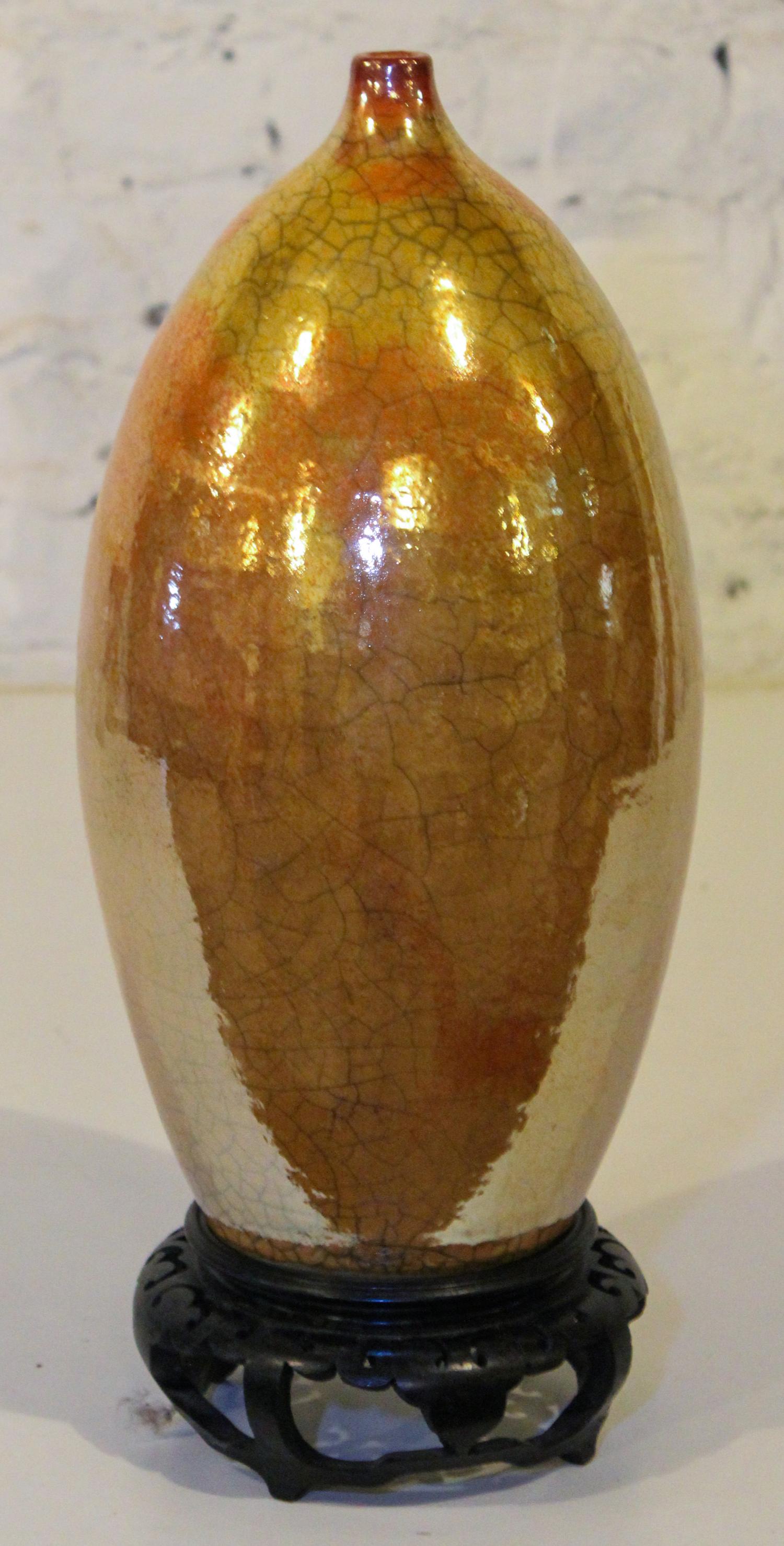 A Studio Ceramic Vase, J. Houck. Height 14 1/4 inches.
