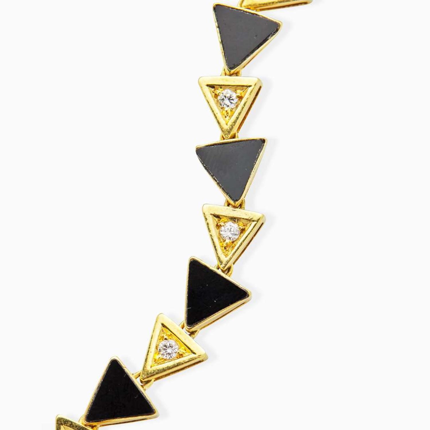 A 14K Yellow Gold, Onyx, and Diamond Necklace