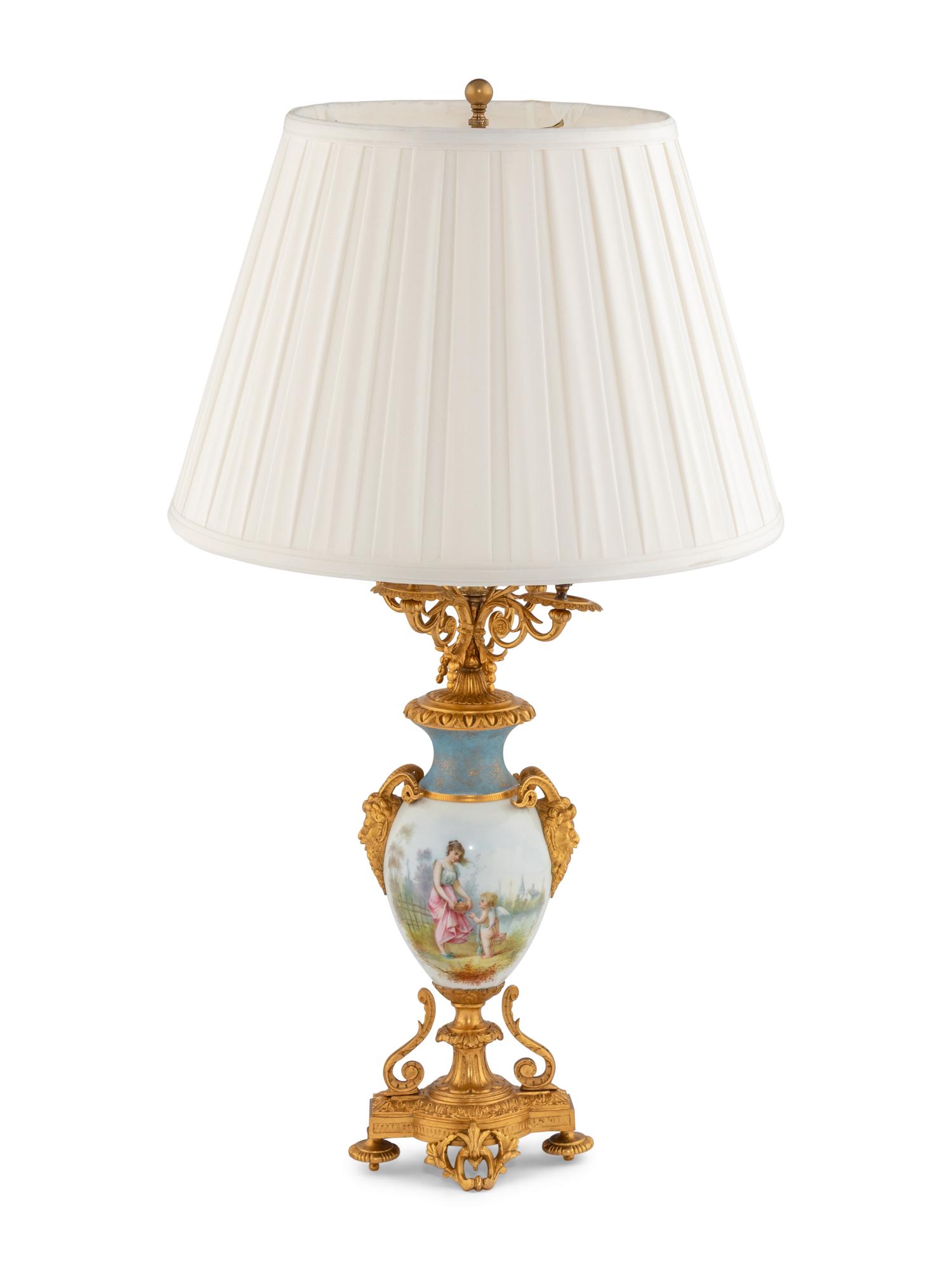 A Gilt Bronze Mounted Sèvres Style Porcelain Urn Mounted as a Lamp