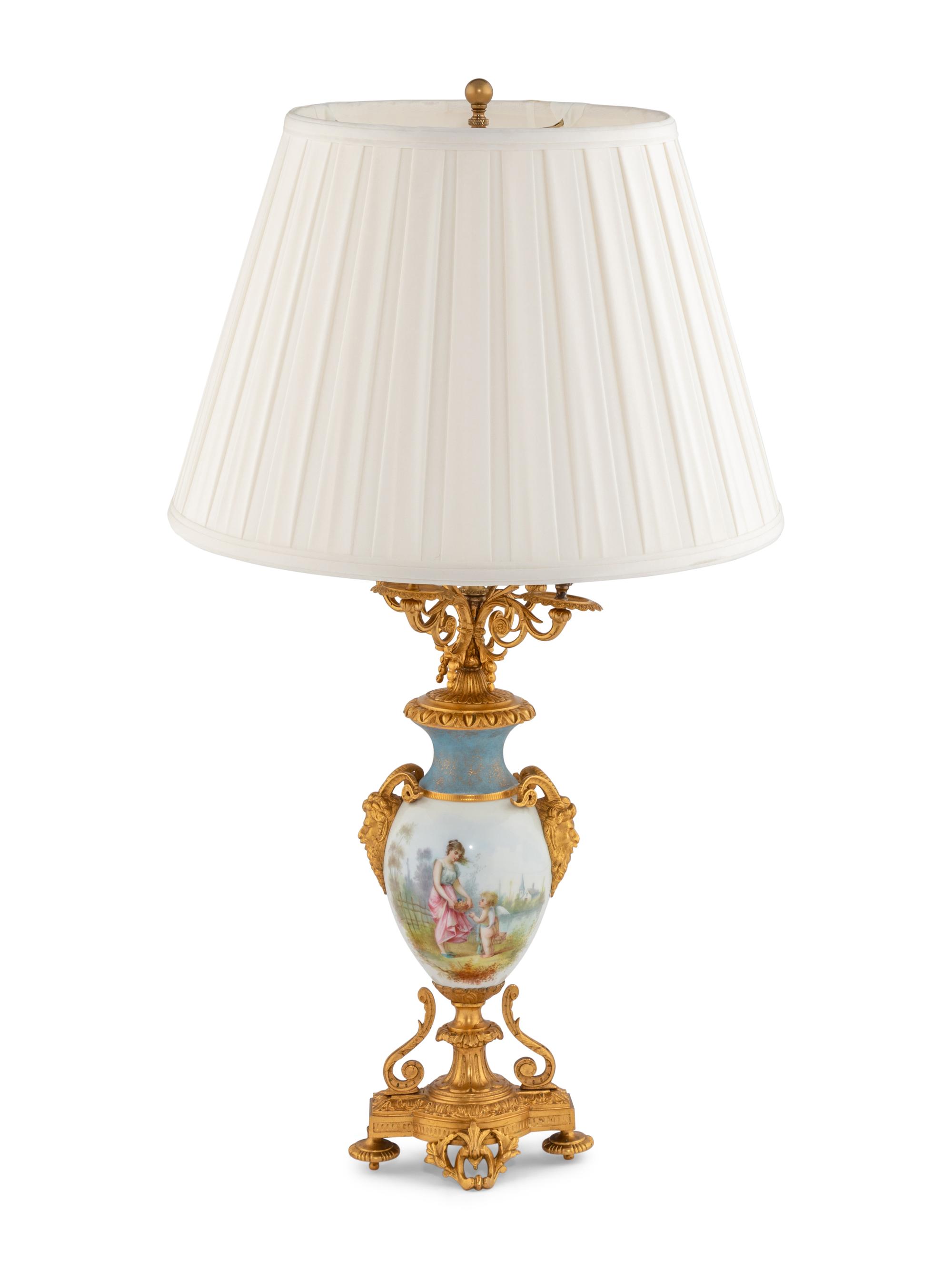 A Gilt Bronze Mounted Sèvres Style Porcelain Urn Mounted as a Lamp