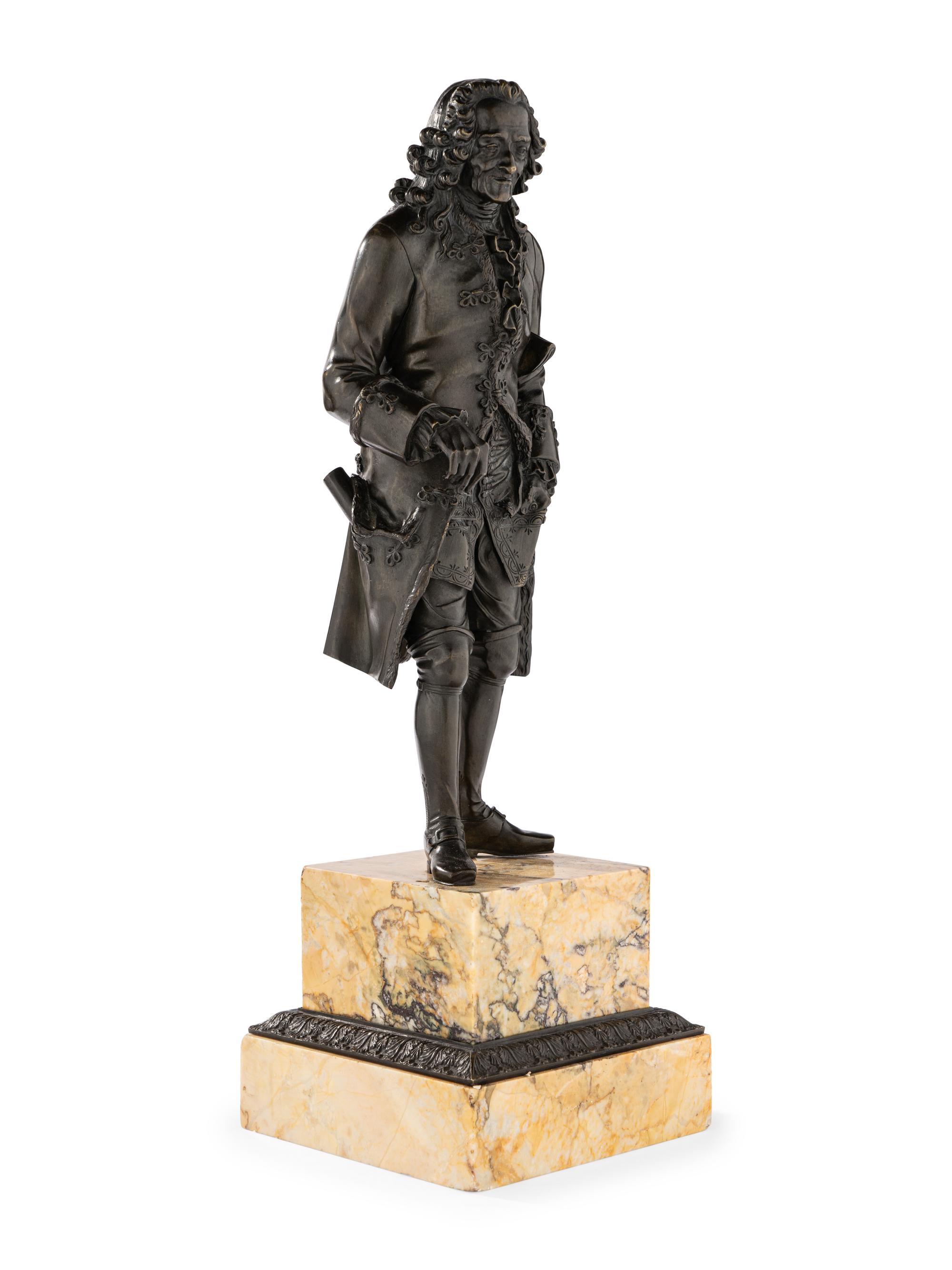 A Pair of French Bronze and Sienna Marble Sculptures of Voltaire and Rousseau