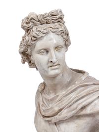 A Terracotta Bust of the Apollo Belvedere and an Acrylic Pedestal