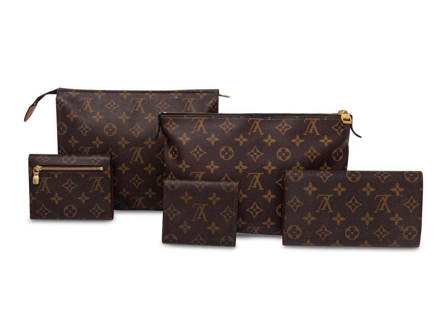 A Collection of Five Louis Vuitton Monogram Accessories