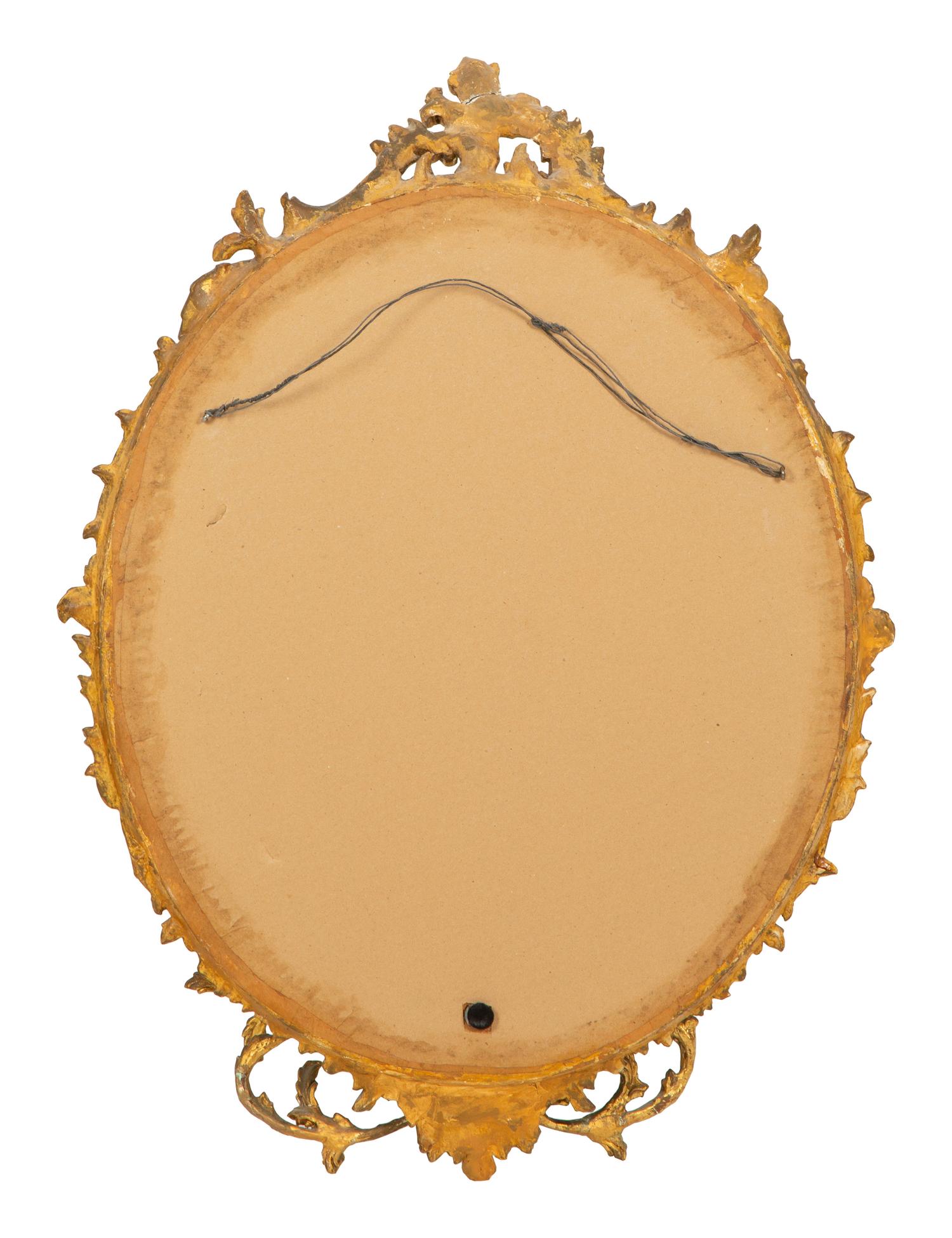 A Rococo-Style Carved Giltwood Girandole Mirror