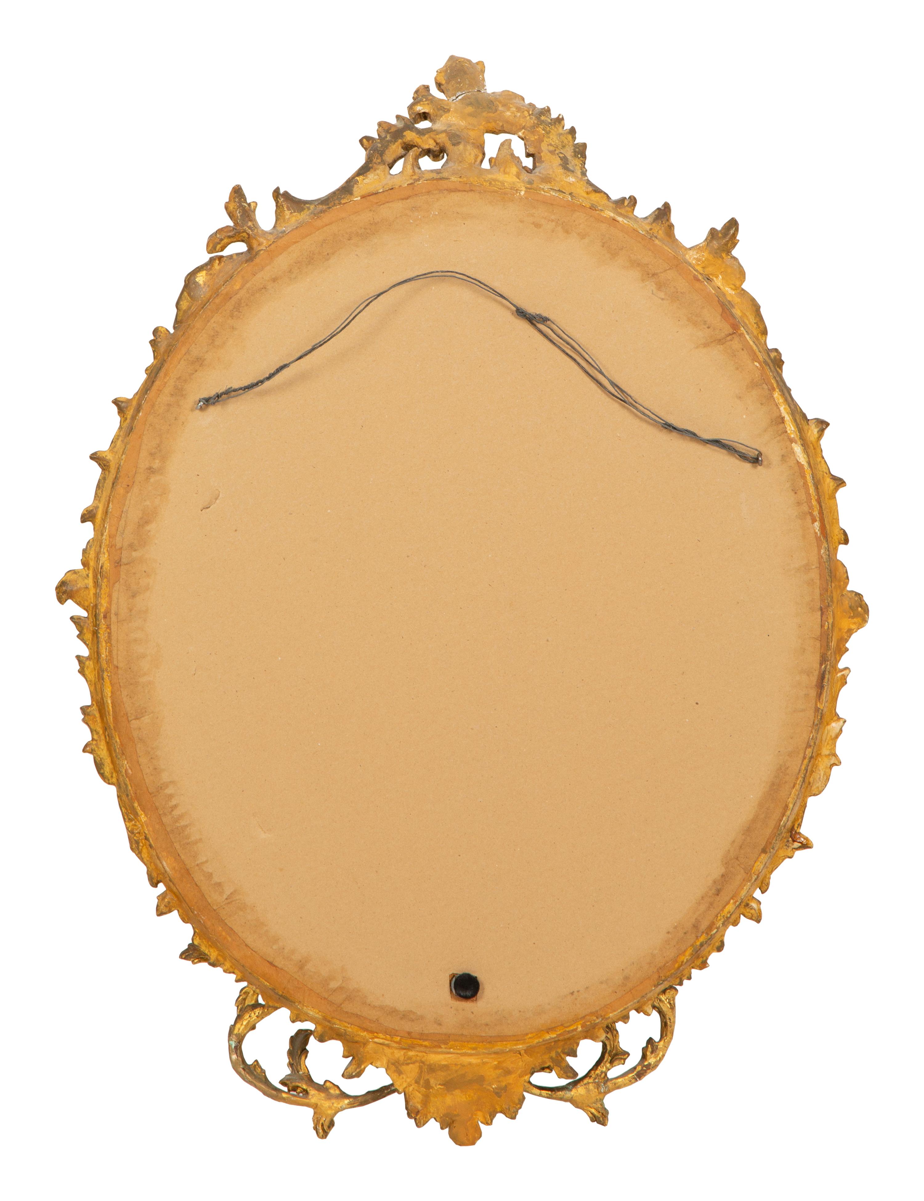 A Rococo-Style Carved Giltwood Girandole Mirror