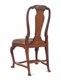 A Queen Anne Volute Carved Walnut Flat-Stretcher Pad-Foot Side Chair