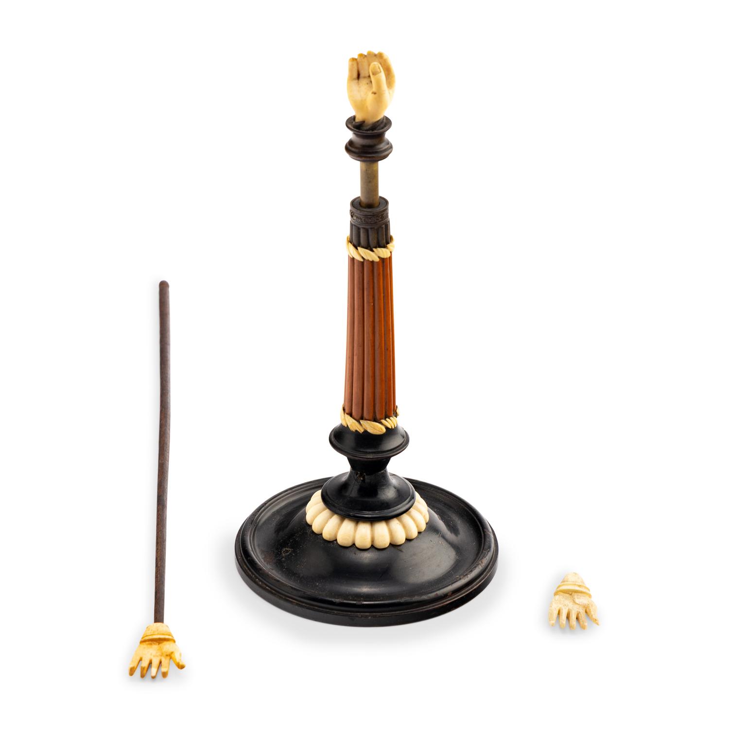 An Austrian Carved and Parcel-Ebonized Columnar Adjustable Quill Stand