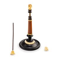 An Austrian Carved and Parcel-Ebonized Columnar Adjustable Quill Stand