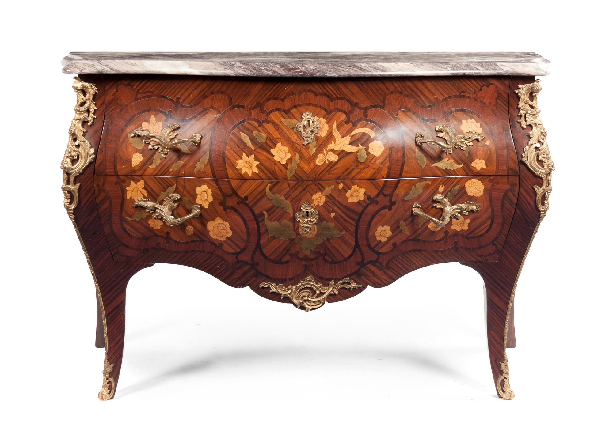 A Louis XV Style Marquetry and Gilt Metal Mounted Commode, Height 33 x width 53 x depth 22 inches.