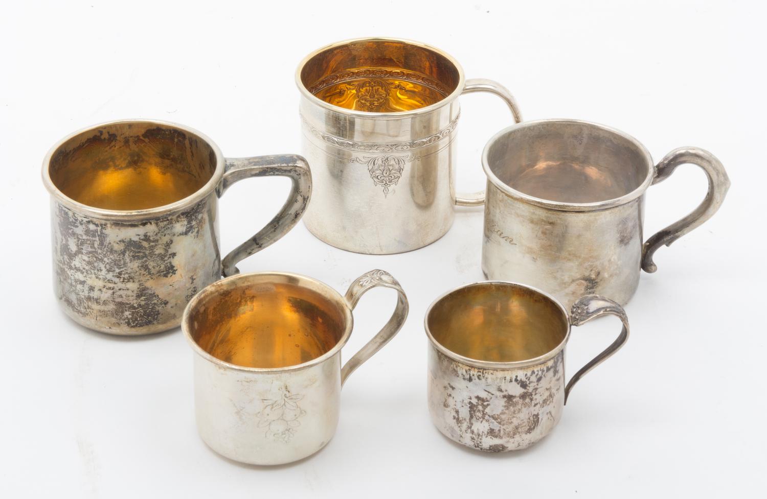 A Collection of Silver Baby Cups Height of first 1 3/4 inches.