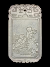 A White Jade 'Boys' Plaque