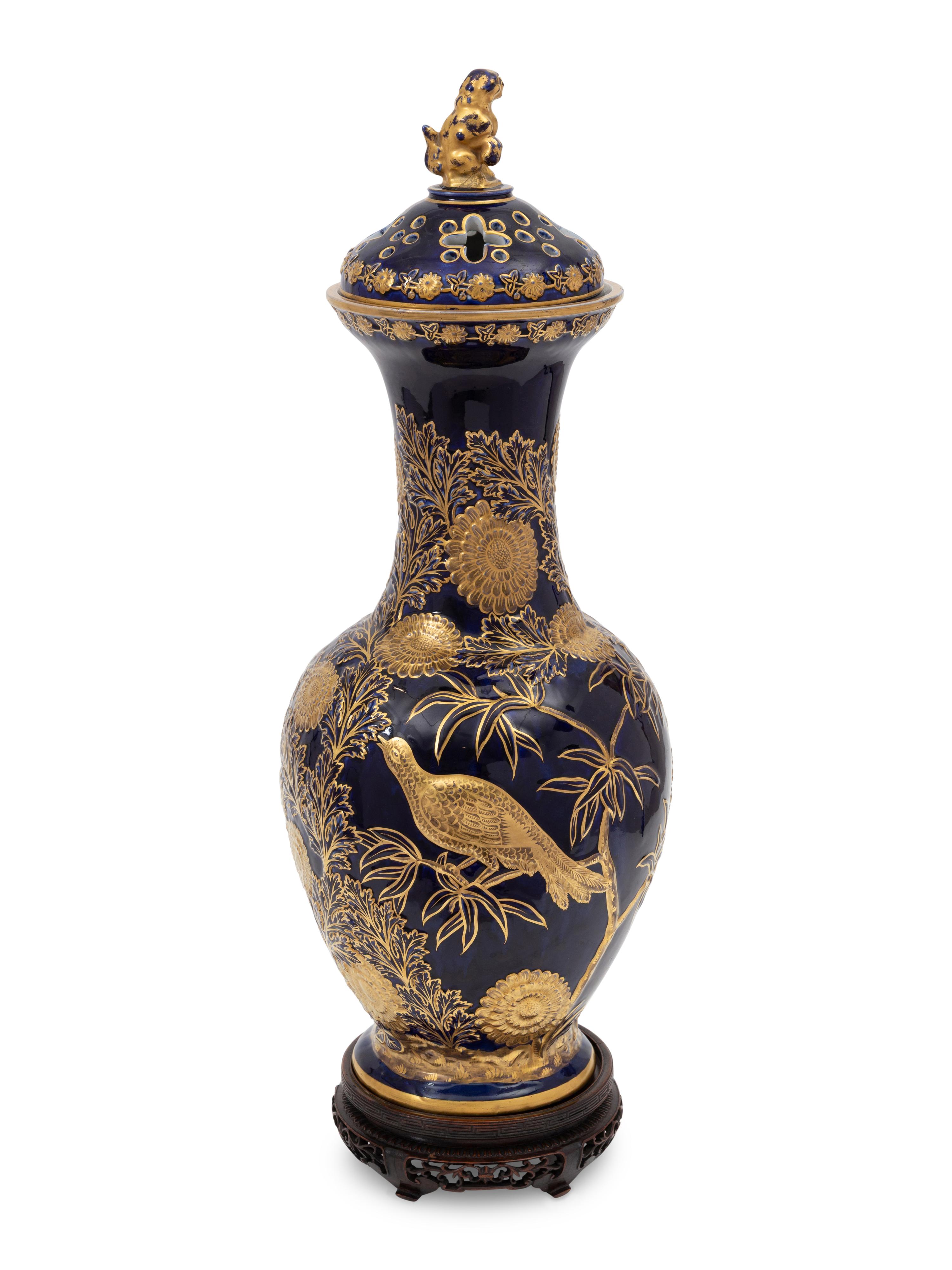 An English Cobalt Glazed and Gilt Decorated Earthenware Potpourri Vase