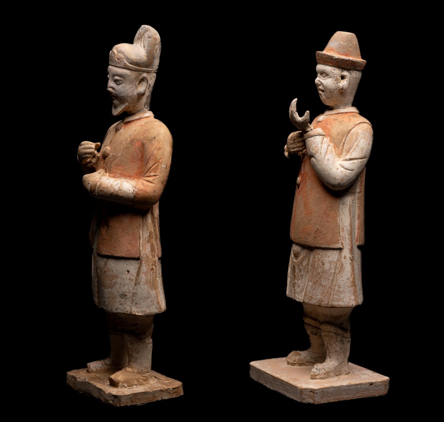 A Pair of Chinese Painted Pottery Figures of Attendants