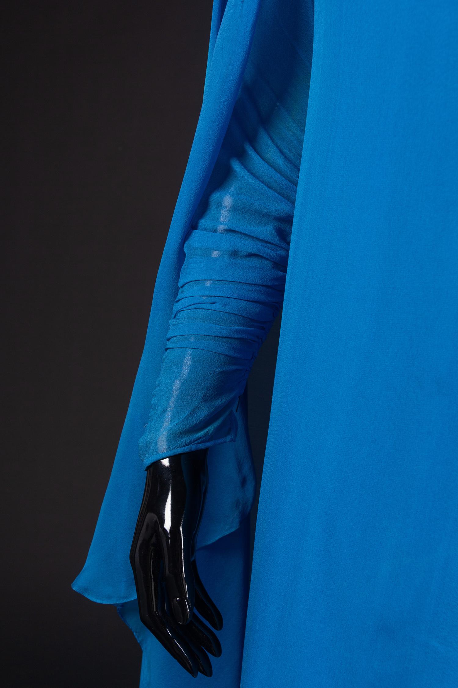 Dress and Shoes, 1982. Dress design by Paul Zastupnevitch, made by Western Costume Company in Los Angeles. — Worn by Olivia de Havilland for ‘The Night of a Hundred Stars II” at the Radio City Hall in New York in 1985. Also worn for the White House State Dinner given by Ronald Reagan in honor of President Francois Mitterand on March 22, 1984.