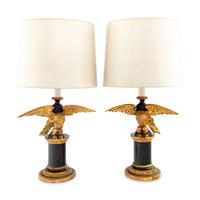 A Pair of Painted and Parcel Gilt Eagle-Form Lamps