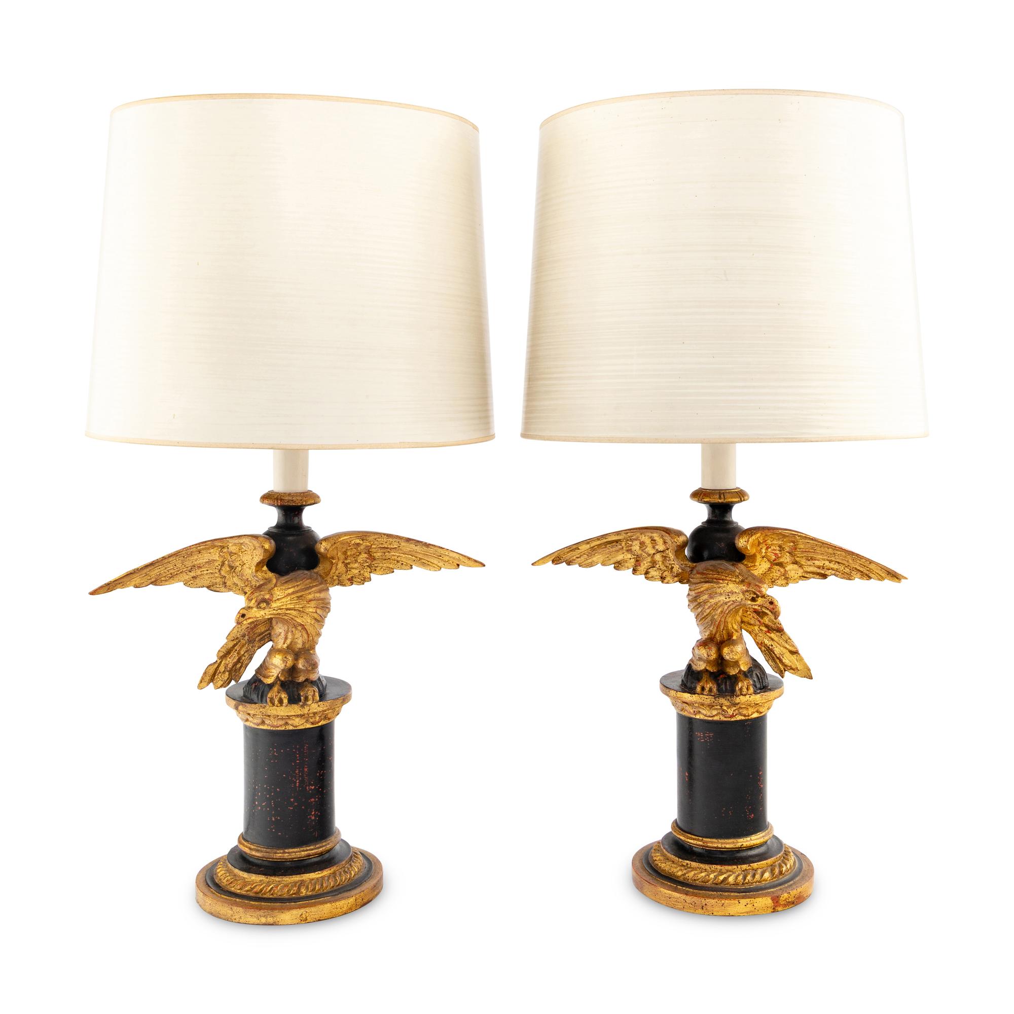 A Pair of Painted and Parcel Gilt Eagle-Form Lamps