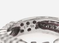 A Ladies Platinum and Diamond Ring
