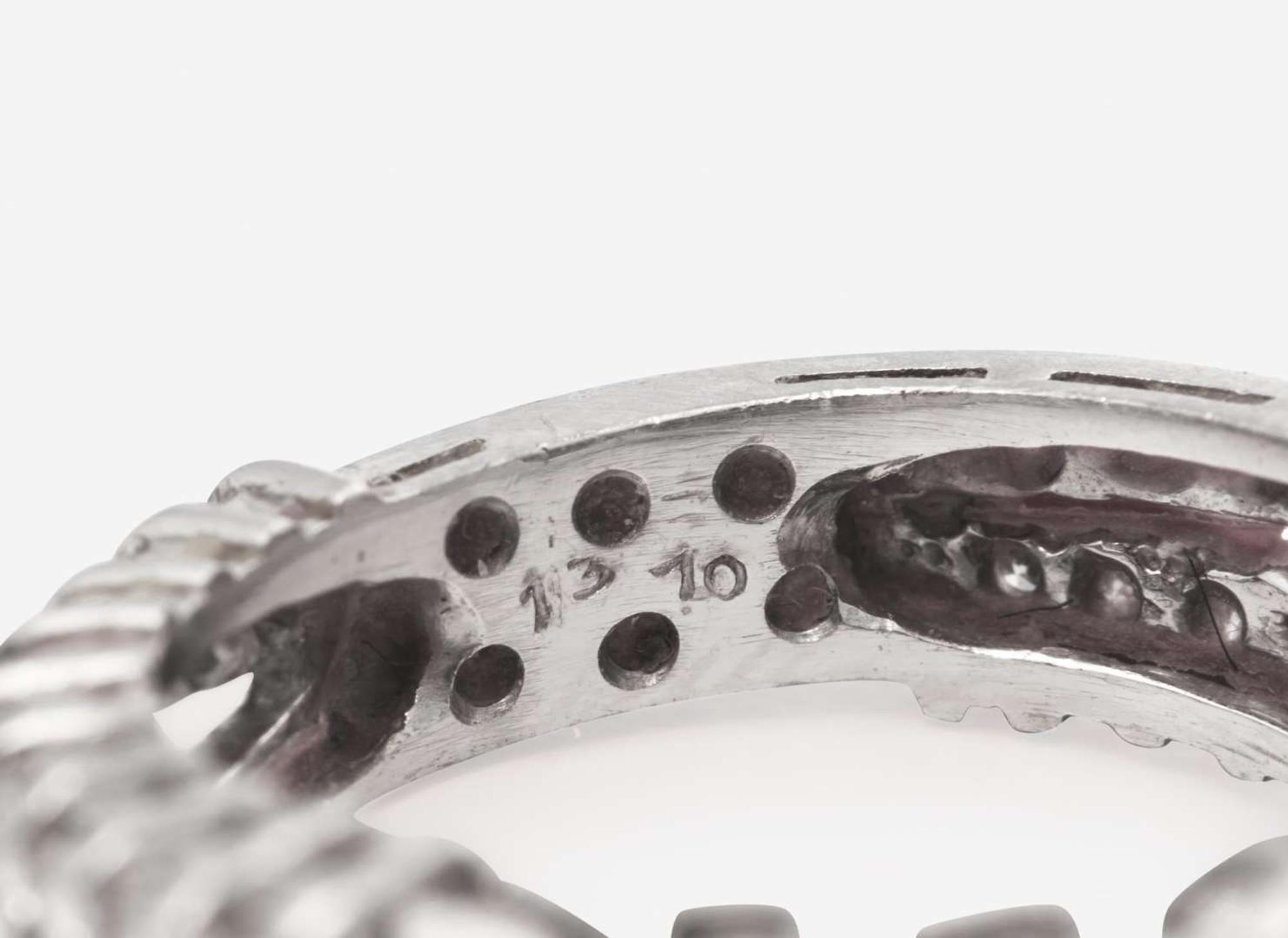 A Ladies Platinum and Diamond Ring