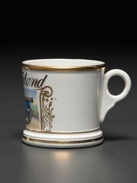 A Porcelain Shaving Mug Depicting an Open Touring Car