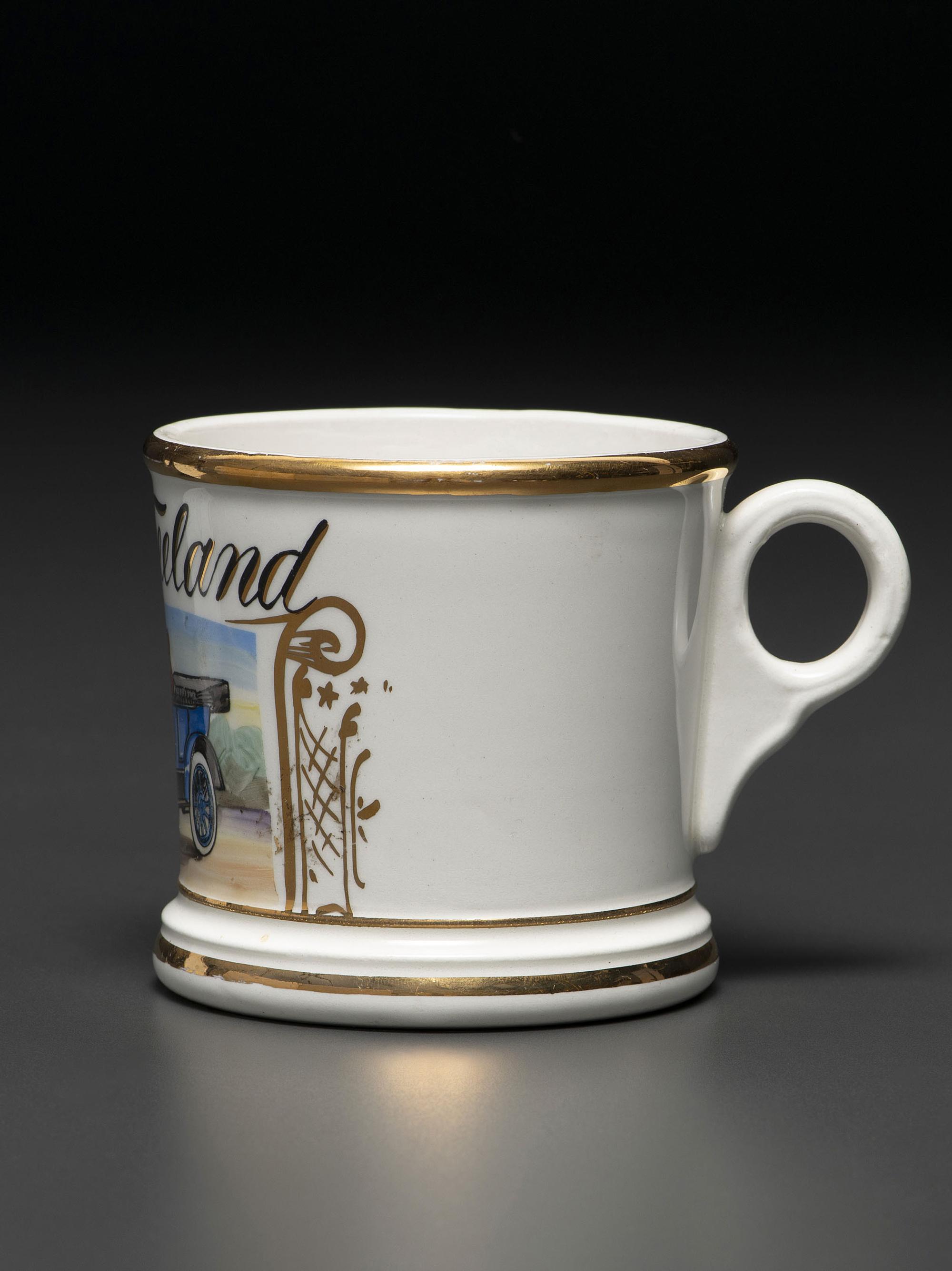 A Porcelain Shaving Mug Depicting an Open Touring Car