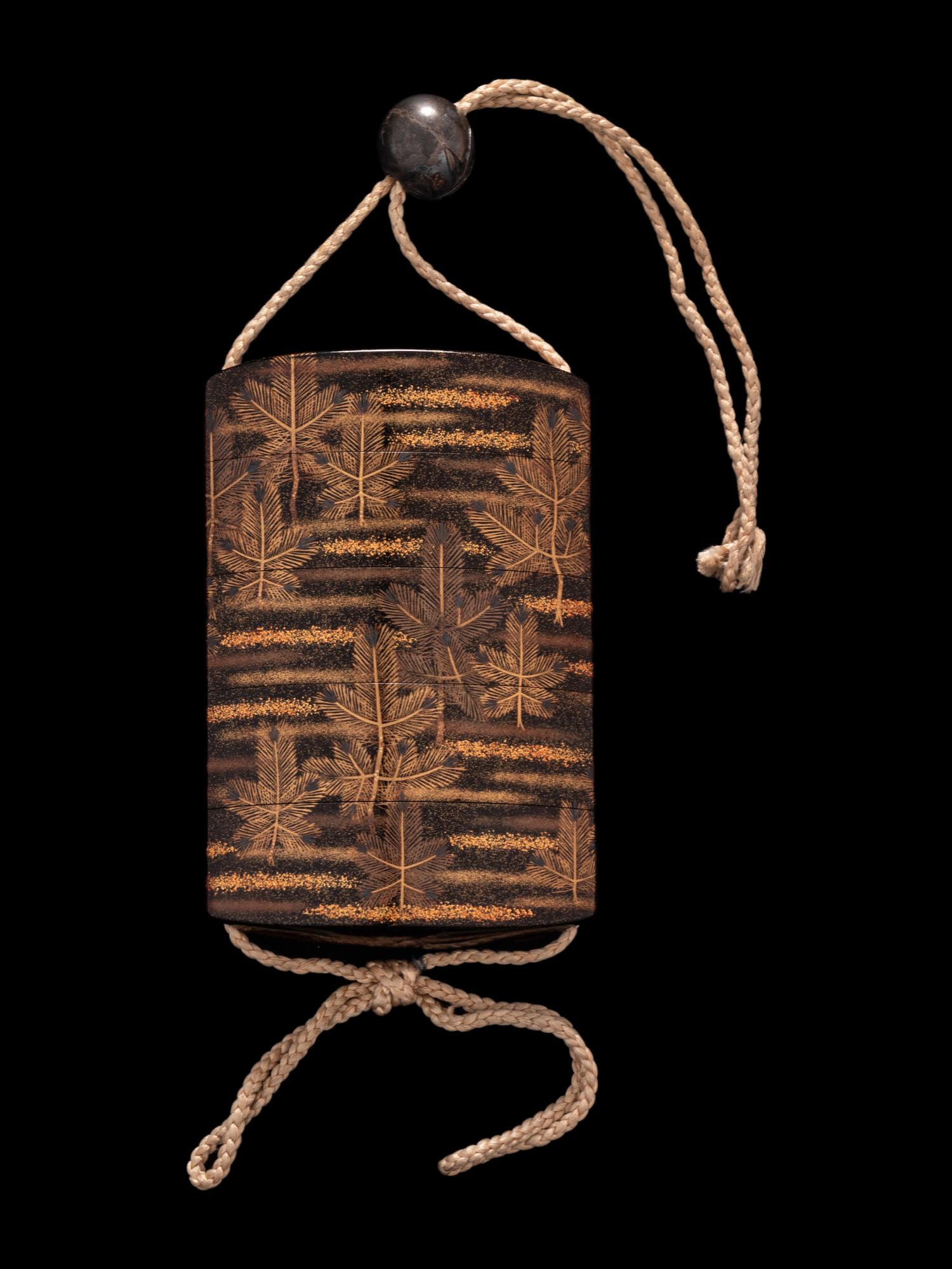 A Japanese Gold and Black Four-Case Inro