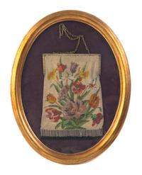 A Victorian Beaded Handbag, Height of bag 9 inches.