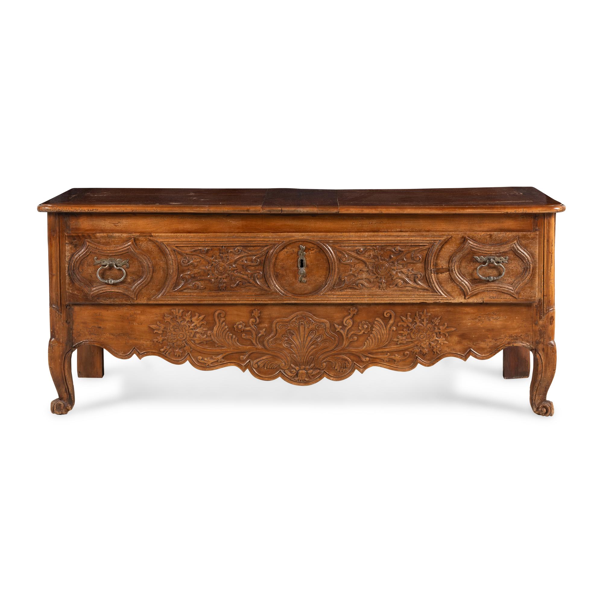 A French Provincial Carved Walnut Lift-Top Chest