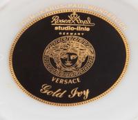 A Versace Gold Ivy Porcelain Dinner Service