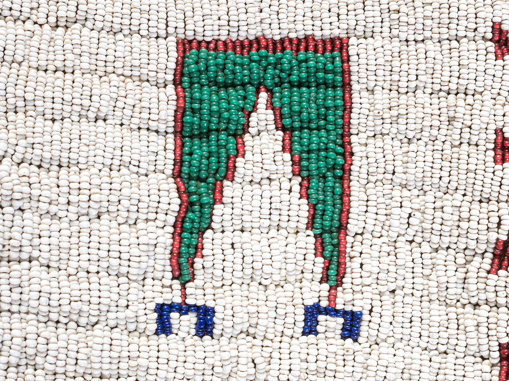 Sioux Child's Beaded Buffalo Hide Vest